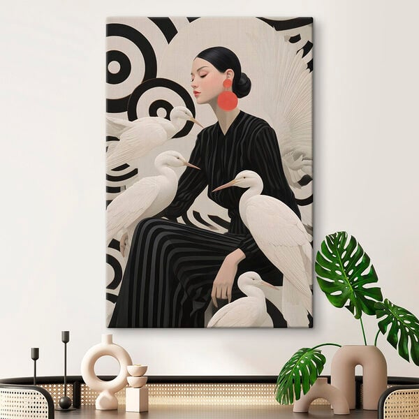Woman sitting with white birds