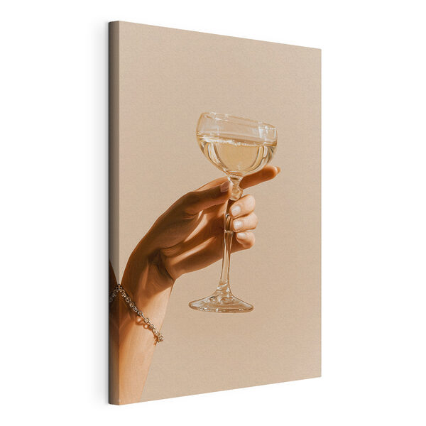 Hand holding a glass of wine